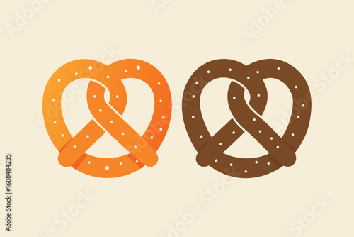 Two Pretzels Orange Pretzel and Brown Pretzel with Salt on Cream Background
