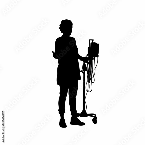 Silhouette of healthcare technician monitoring dialysis machine alarms