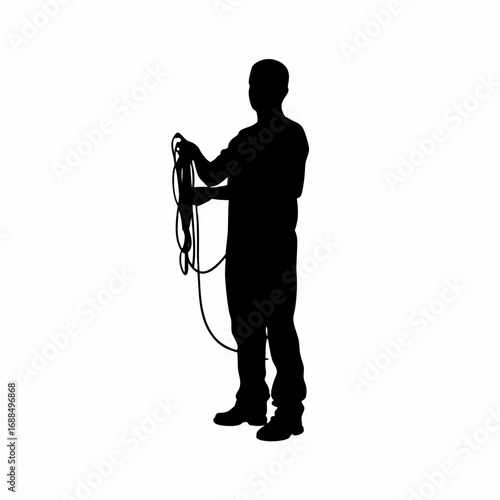 Silhouette of medical technician untangling dialysis tubing