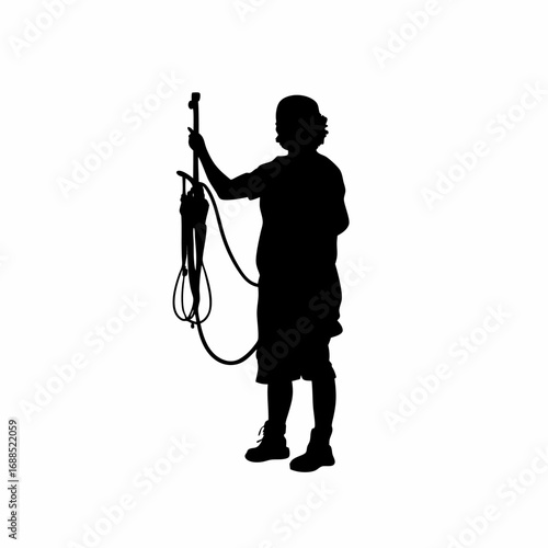 Silhouette of medical technician connecting dialysis machine