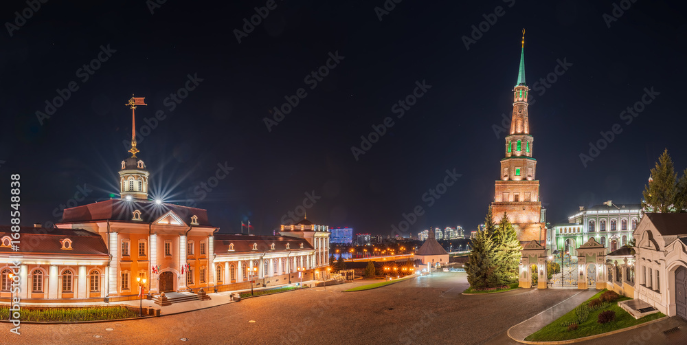 Obraz premium The ancient leaning red brick Syuyumbike Tower at night on the territory of the Kazan Kremlin. Russia