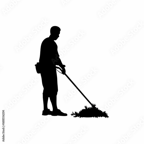 Silhouette of agricultural worker cleaning vineyard harvester after harvest