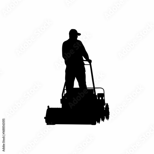 Silhouette of farmer operating harvester machine adjusting controls