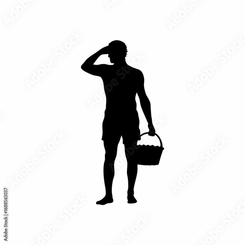 Silhouette of a tired worker wiping sweat while carrying a basket of grapes
