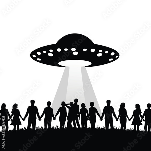 Black silhouette U F O beaming light onto group of people holding hands