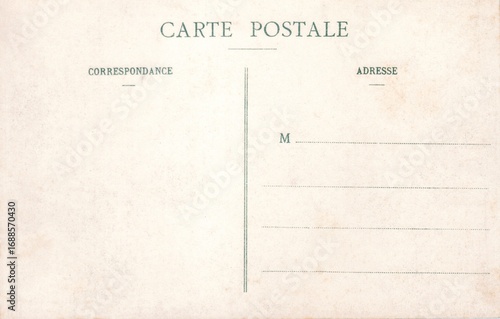 Blank vintage postcard with French text, featuring sections for correspondence and address. Aged texture and faded print give it an antique feel