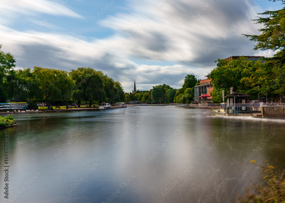 Fototapeta premium River Avon flowing through Stratford-upon-Avon with long exposure effect
