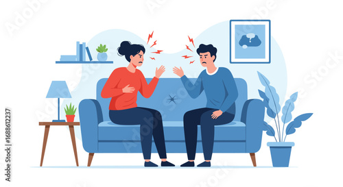 Couple arguing loudly sitting on sofa at home during relationship conflict