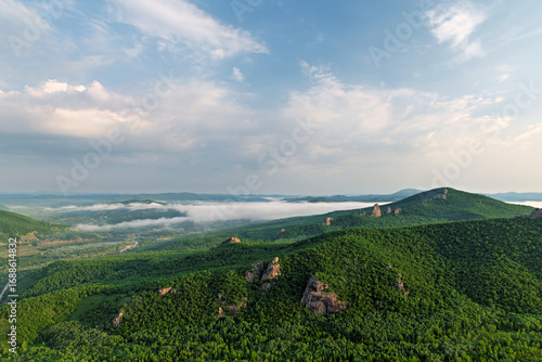 Fotografie Morning Mist over Lama Mountain, Balin Town, Yakeshi City, Inner Mongolia Autono