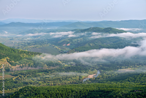 Fotografie Morning Mist over Lama Mountain, Balin Town, Yakeshi City, Inner Mongolia Autono