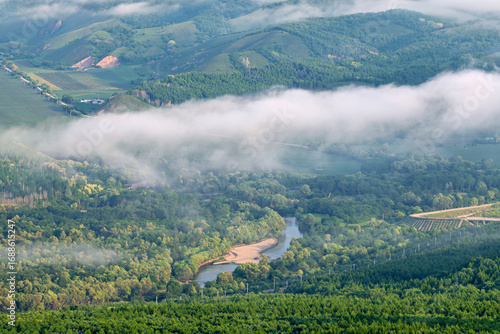 Fotografie Morning Mist over Lama Mountain, Balin Town, Yakeshi City, Inner Mongolia Autono
