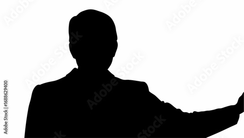 Silhouette of a man in a suit pointing to the right with his arm extended against a white background