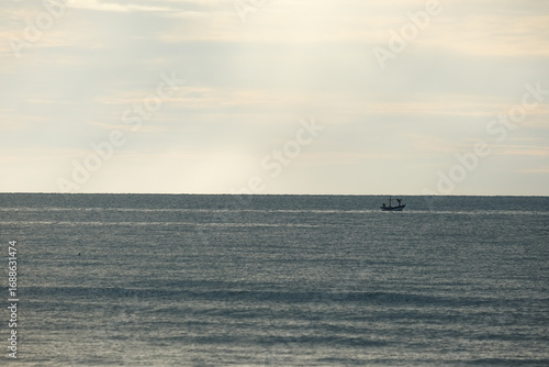 fishing boat at sunset