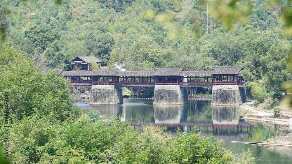 Fototapeta premium The old arched stone bridge view located in the countryside of the China 