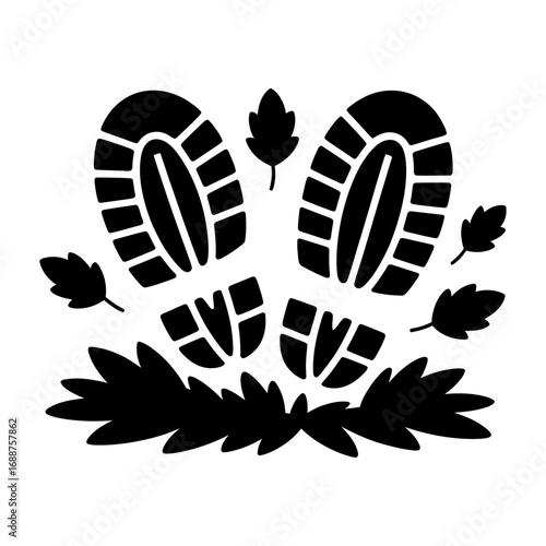 black silhouette of footprint trail with leaves and plants