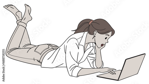 Woman lying on floor working on laptop surprised expression casual clothes.