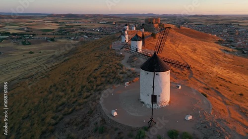 Aerial view of the windmills of Consuegra at sunrise, Castilla-La Mancha, Spain.
