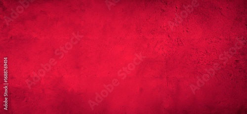 Red textured wall background with rough surface
