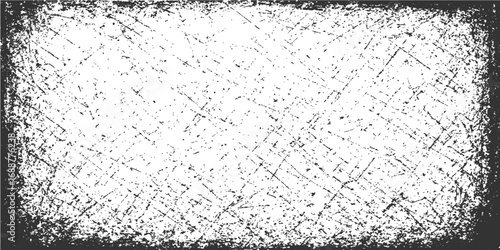 Grungy black and white frame on a textured gray concrete wall with a vintage dirt pattern