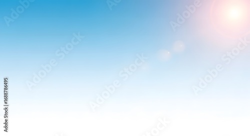Bright Blue Sky with Soft Sunlight and White Horizon.