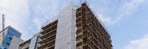High rise residential building of flats with cladding being replaced with fire resistant materials