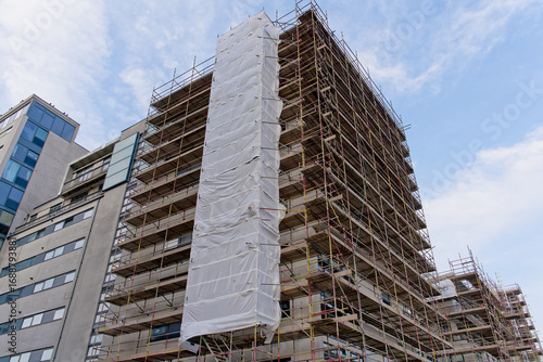 High rise residential building of flats with cladding being replaced with fire resistant materials