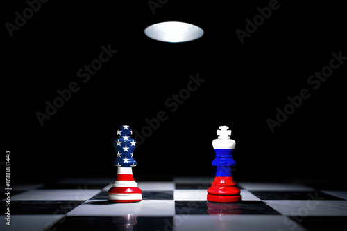 USA versus Russia geopolitical chess game with American and Russian king pieces symbolizing global power struggle and strategic competition, highlighting international relations and political tensions