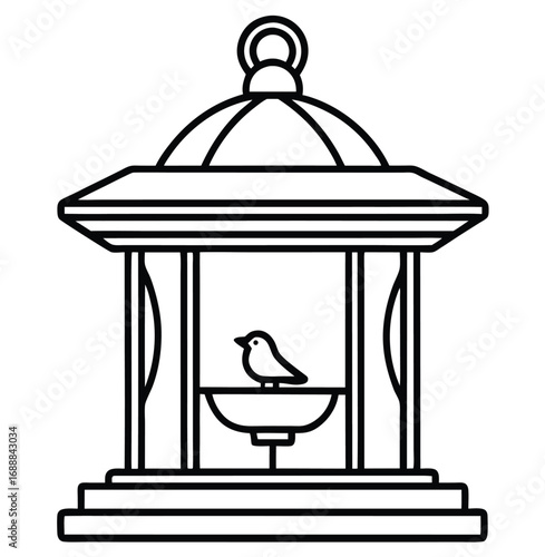 Antique lamp with a caged bird and a candle