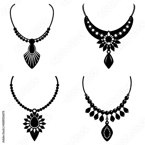 Collection of four necklaces with different pendants and bead arrangements in a black and white image