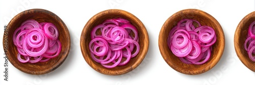 Thinly sliced, vibrant pink onion rings in small, wooden bowls