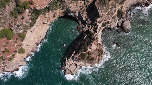 Aerial Panorama of Grotta delle Colombe Cave on Sicily Island, Scenic Coastal Landmark Italy
