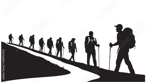 Group of Hikers Ascending Mountain Trail in Silhouette