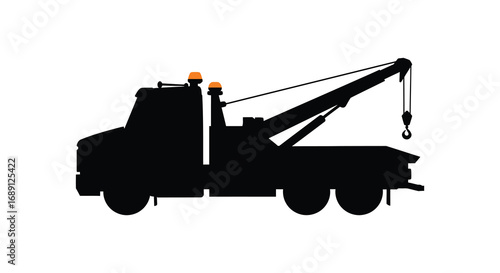 a silhouette of a tow truck with extended crane arm