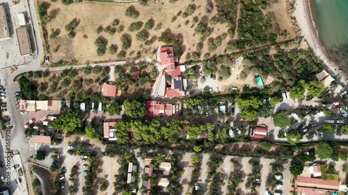 Aerial Drone Panorama of Camper Van Camping Zone on Coastline of Cefalù, Sicily Island Italy