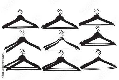 Collection of clothes hangers in various designs, isolated on white background, perfect for organizing closets, fashion, retail, and wardrobe management