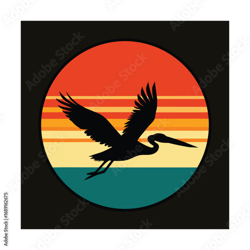 Silhouette of a flying bird against a retro sunset