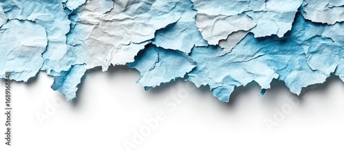 Frigid Layers of Torn Blue Paper Creating a Textured, Icy Border