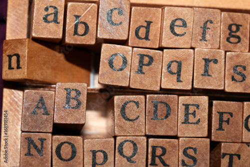 Bilde på lerret Jumbled up block wood print letters lined up