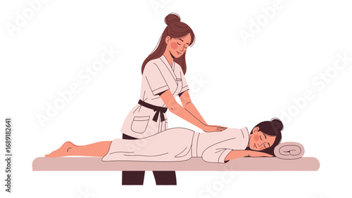 Skilled massage therapist gently massaging a relaxed client on a spa table