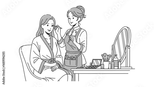 A professional makeup artist applies cosmetics to a client sitting in a chair in a well lit vanity area