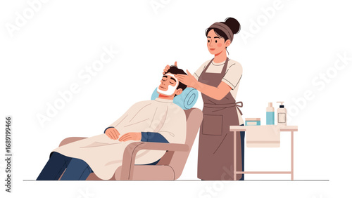 Skilled barber expertly trims client s hair while he relaxed in a comfortable salon chair