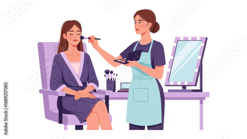 Professional makeup artist applying blush to a client seated in a salon chair with a vanity mirror