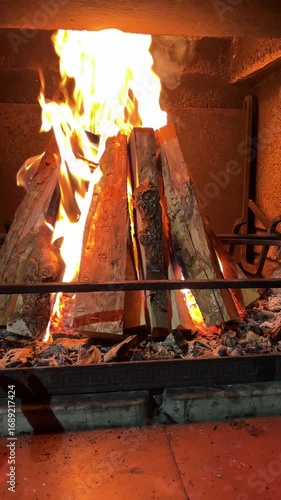 Wallpaper Mural Warm Flames Dance in a Cozy Fireplace During a Chilly Evening Torontodigital.ca