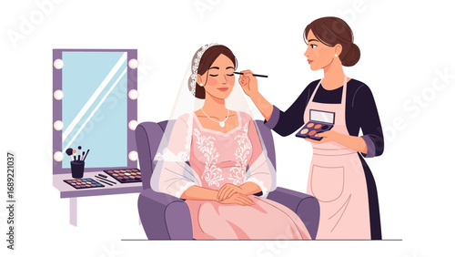 Professional makeup artist applying cosmetics to a woman sitting in a chair in front of a lighted mirror