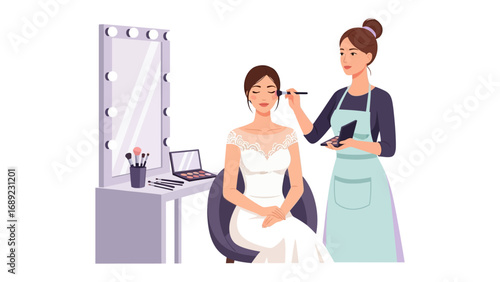 Bride receives professional makeup application before wedding day ceremony at vanity mirror station