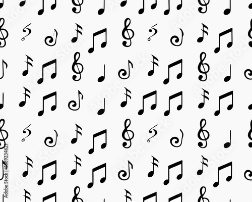 Seamless pattern of black music notes and symbols on white background