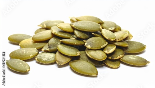 Fresh pumpkin seeds with smooth oval shape crunchy organic healthy snack food isolated on white background
