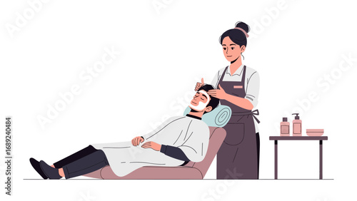Skilled hairstylist carefully cuts and styles hair for a relaxed client in a salon setting