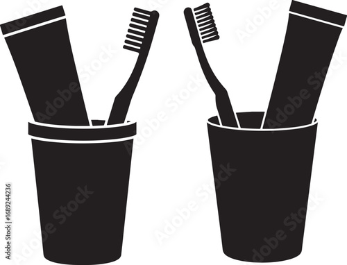 Two toothbrushes and toothpaste cups silhouette
