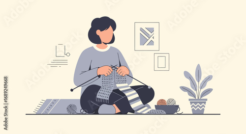 Woman knitting a scarf or blanket with yarn and needles at home, enjoying a peaceful hobby